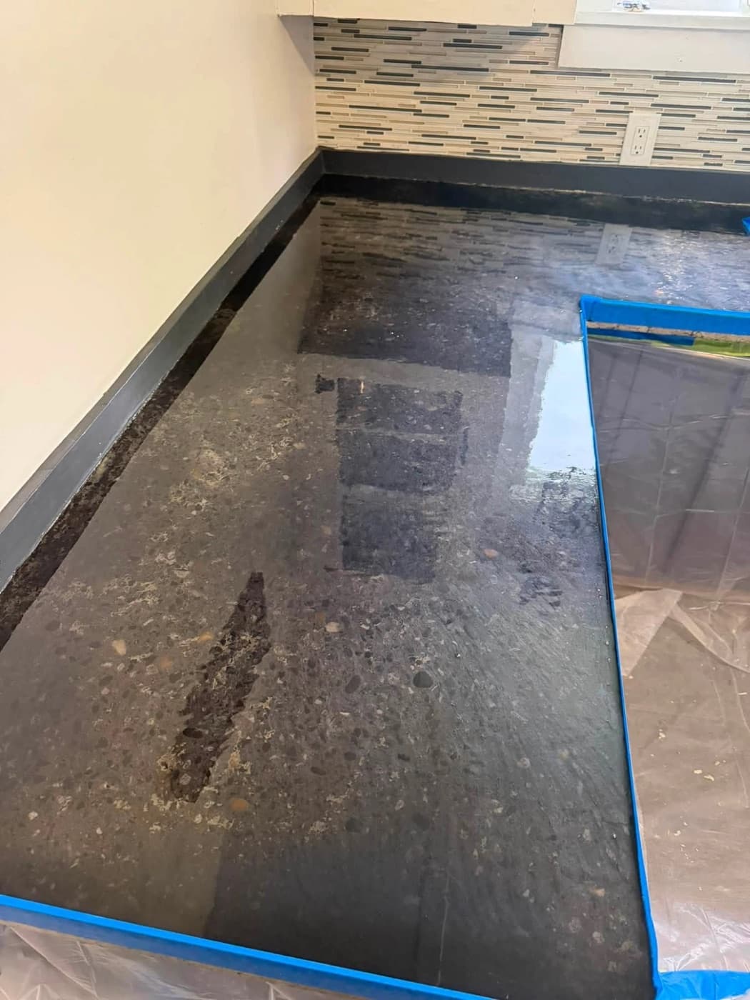 Epoxy countertop being coated by Raines Epoxy